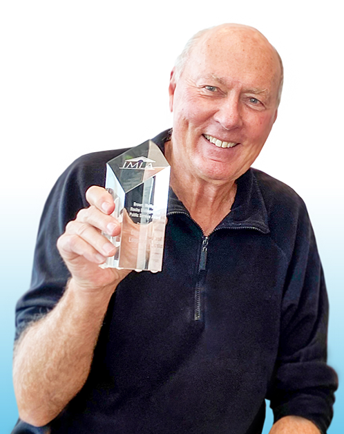 Chuck-Loopstra-with-the-Brown-Mulligan-Rocha-Distinguished-Public-Service-Award